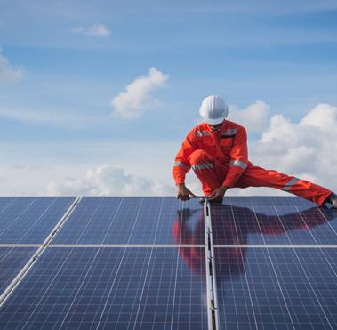 Employee working on solar panel 